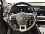 the interior of a car with a steering wheel and dashboard controls