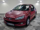 a picture of a red car parked in a garage