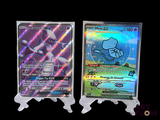 two pokemon cards on display on a black background