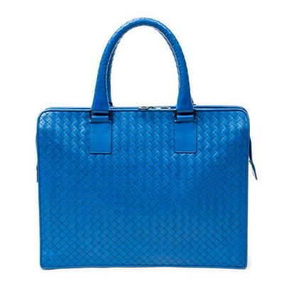a blue bag with a handle and handles on a white background