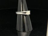 a close up of a ring on a cone on a table