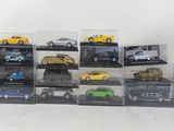 a lot of toy cars that are in a display case