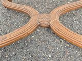 an image of a wooden table sitting on top of a parking lot