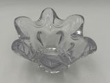 clear glass bowl on a white table with a white background