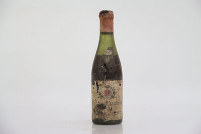 a bottle of wine that is sitting on a table