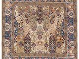 un ancien tapis persan à motif floral