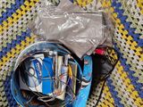 a bag of cigarettes and a can of soda on a rug