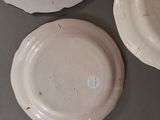 three plates that are sitting on a table