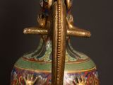 an image of a vase with an elephant on it ' s head