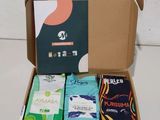 a box with a variety of teas inside of it