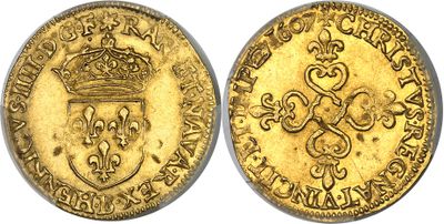 a gold coin with a crown on top of it