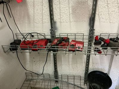 a picture of a wire shelving with tools on it