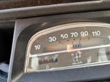 a close up of a speedometer in a car