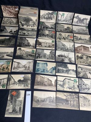 a lot of old postcards that are on the table