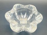 a close up of a clear glass bowl on a table