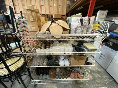 a metal rack with various items on it in a store