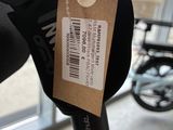a parking meter with a price tag attached to it