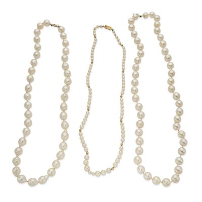 three pearl necklaces on a white background
