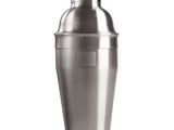 a close up of a metal cocktail shaker on a white surface
