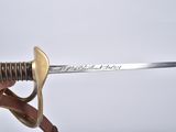 a person holding a sword in their hand