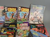 a lot of comic books that are on the table
