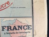 a newspaper with a map of france on it