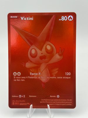 a red card with a picture of a pokemon character on it