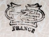 a picture of a drawing on a piece of leather