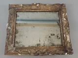 a mirror that is sitting on a table