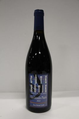 a bottle of wine that is sitting on a table