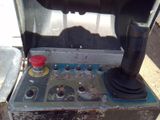 a close up of a control panel with a red button