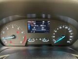 the dashboard of a car with a digital display on it