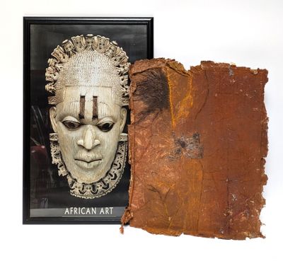 a picture of a piece of cloth with a mask on it