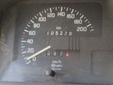 a close up of a speedometer in a car