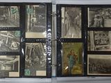 a lot of old black and white photos in a binder