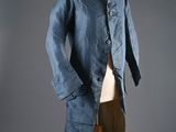 an image of a blue coat on a mannequin stand