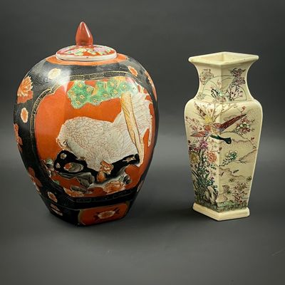 two vases sitting next to each other on a table