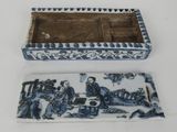 pair of blue and white porcelain boxes with figures in a landscape