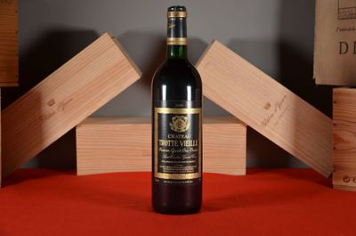 a bottle of wine that is sitting on a table