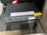 an image of a glass table with a laptop on top of it