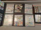 many different types of stamps on a display case