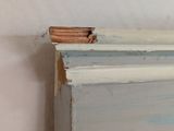 a close up of a piece of wood that has been chipped off
