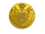 an image of a gold coin with a crown on it