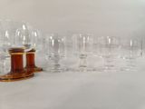 a lot of empty wine glasses on the table