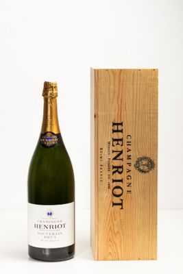 an image of a bottle of champagne next to a wooden box