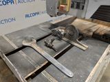 an image of a machine that is working on a piece of metal
