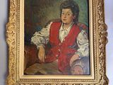 un tableau représentant une femme vêtue d'un gilet rouge et de chaussures noires
