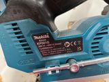 a corded sander that is sitting on a table