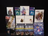 a lot of books that are sitting on a table