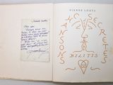 an open book with writing on it with a picture of a person